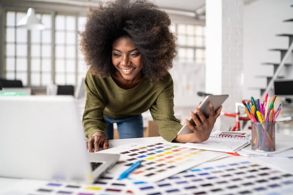 Marketer looking at color swatches for a rebrand